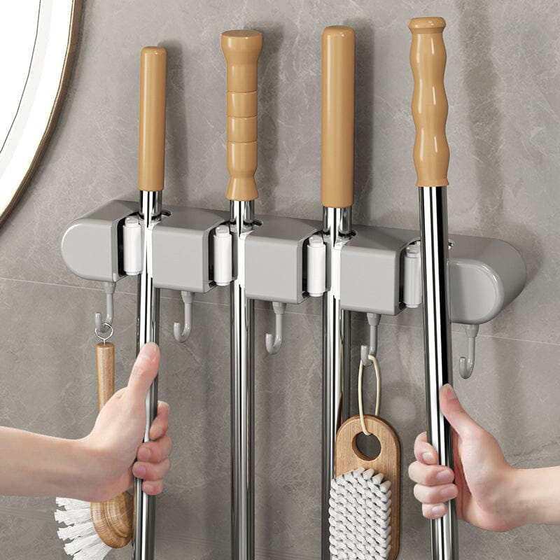 🧹 50% OFF NOW! 🚪 Multifunctional Mop Holder with Hook – Space-Saving, Strong Adhesive & Perfect for Home Organization 🏠